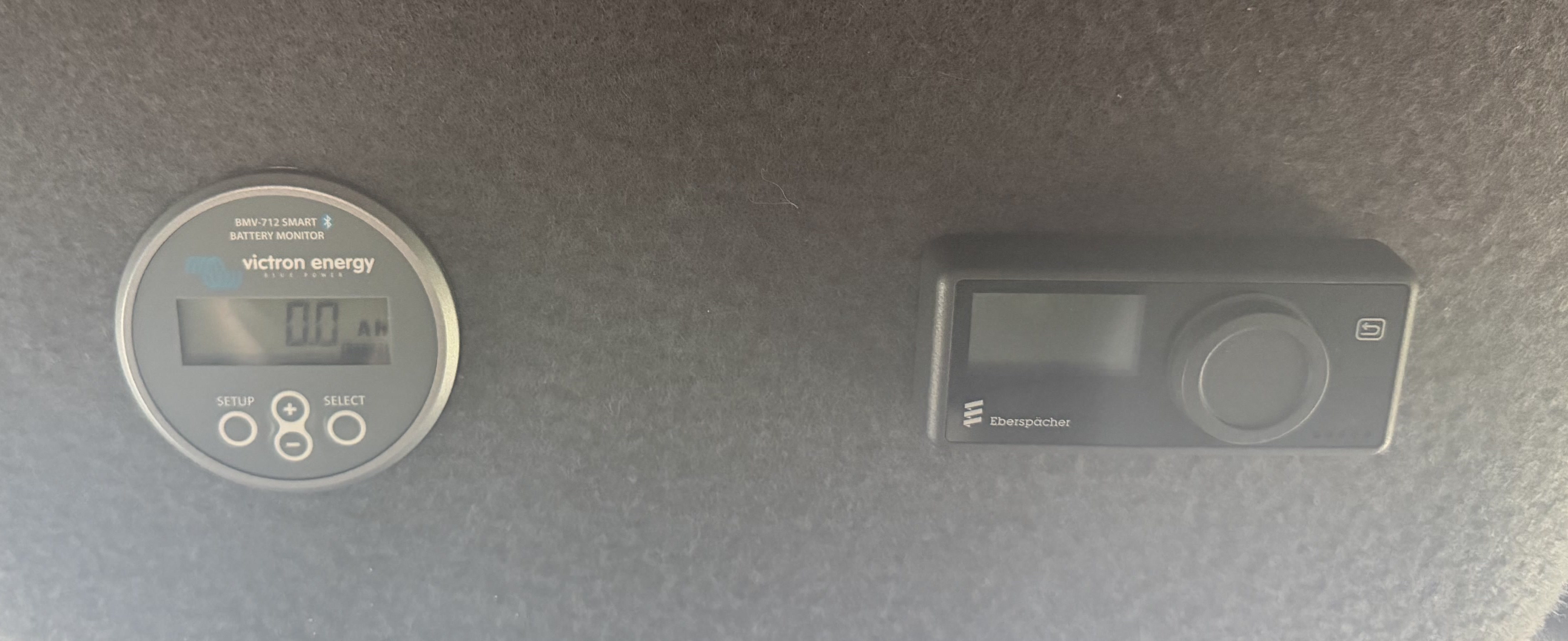 Victron Energy BMV-712 Smart battery monitor beside the Eberspächer heater control